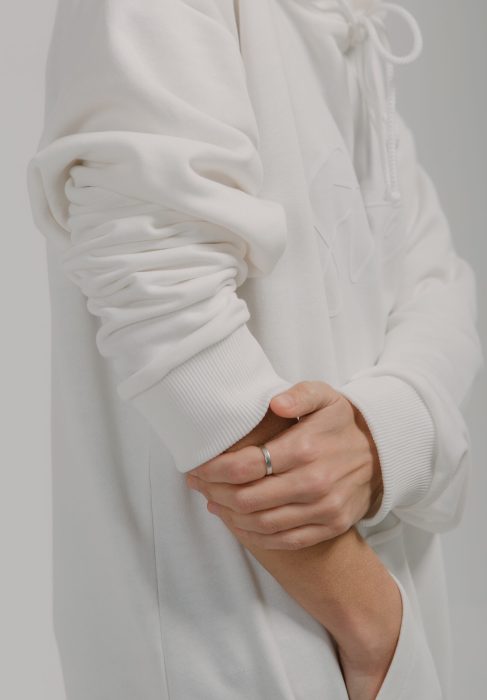 sweatshirt long sleeves female hands close up elastic bands